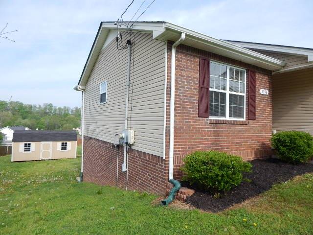 Left side of home. 