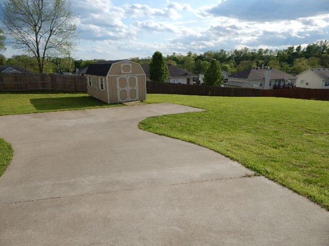 Great back yard with extra concrete parking areas. 