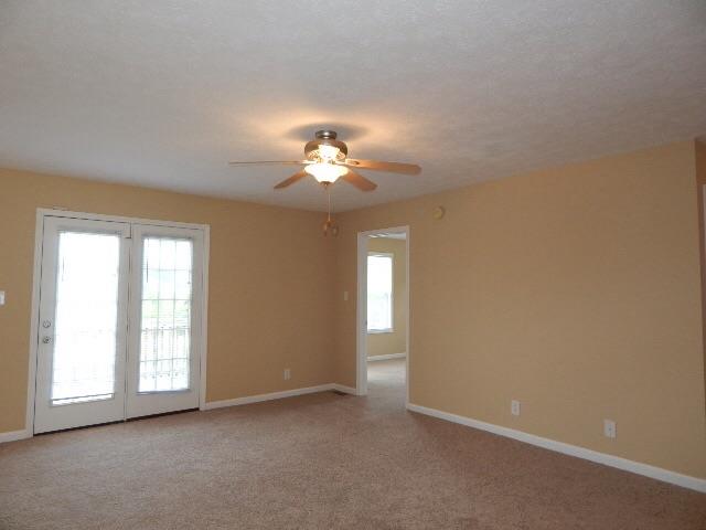 3396 Shivas Road Clarksville, TN 37042 - Photo 10 of 20 Light and airy living room with deck entrance.
