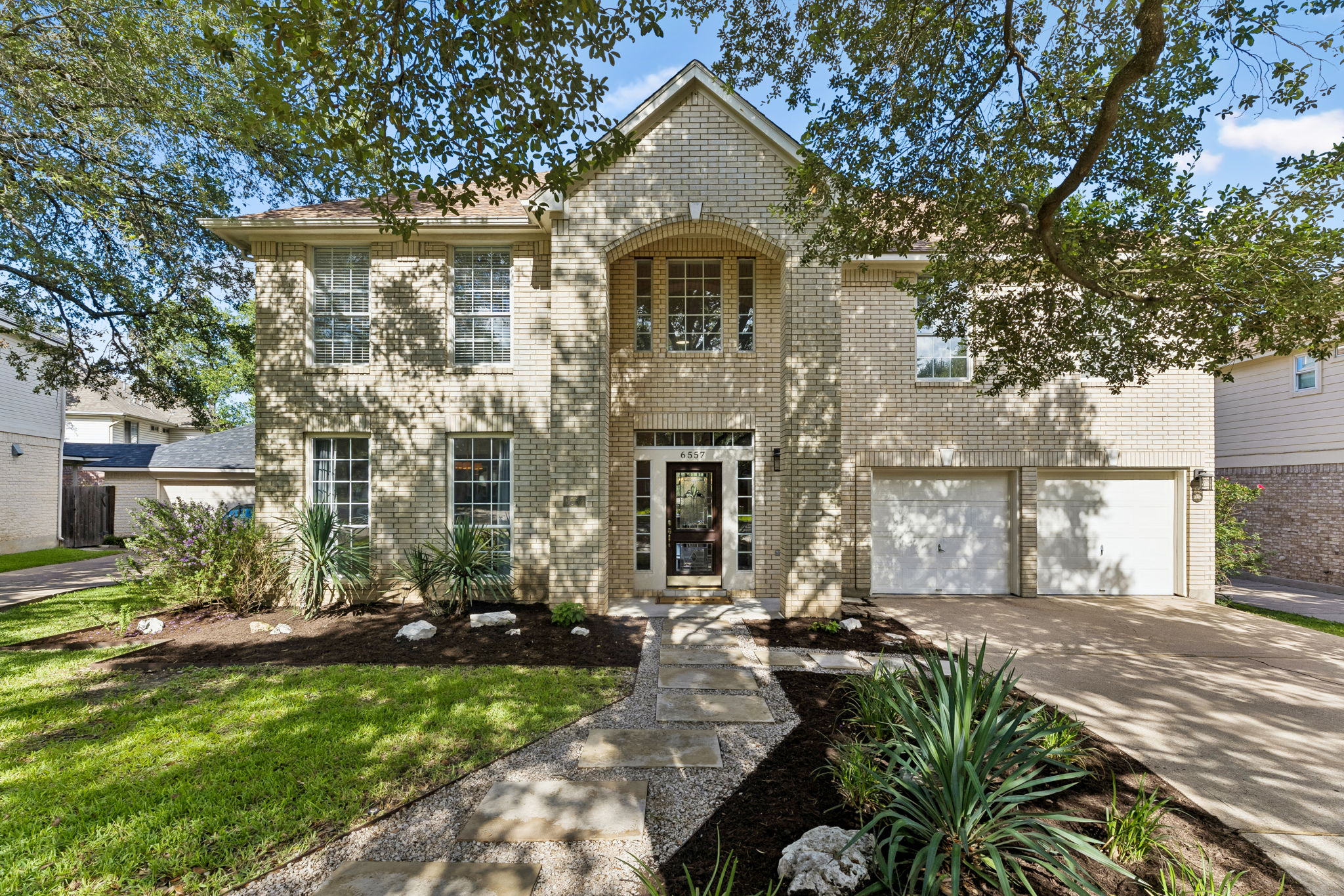 6557 Needham Lane Austin, TX 78739 - Photo 2 of 37 Nestled beneath mature shade trees in the heart of Circle C Ranch