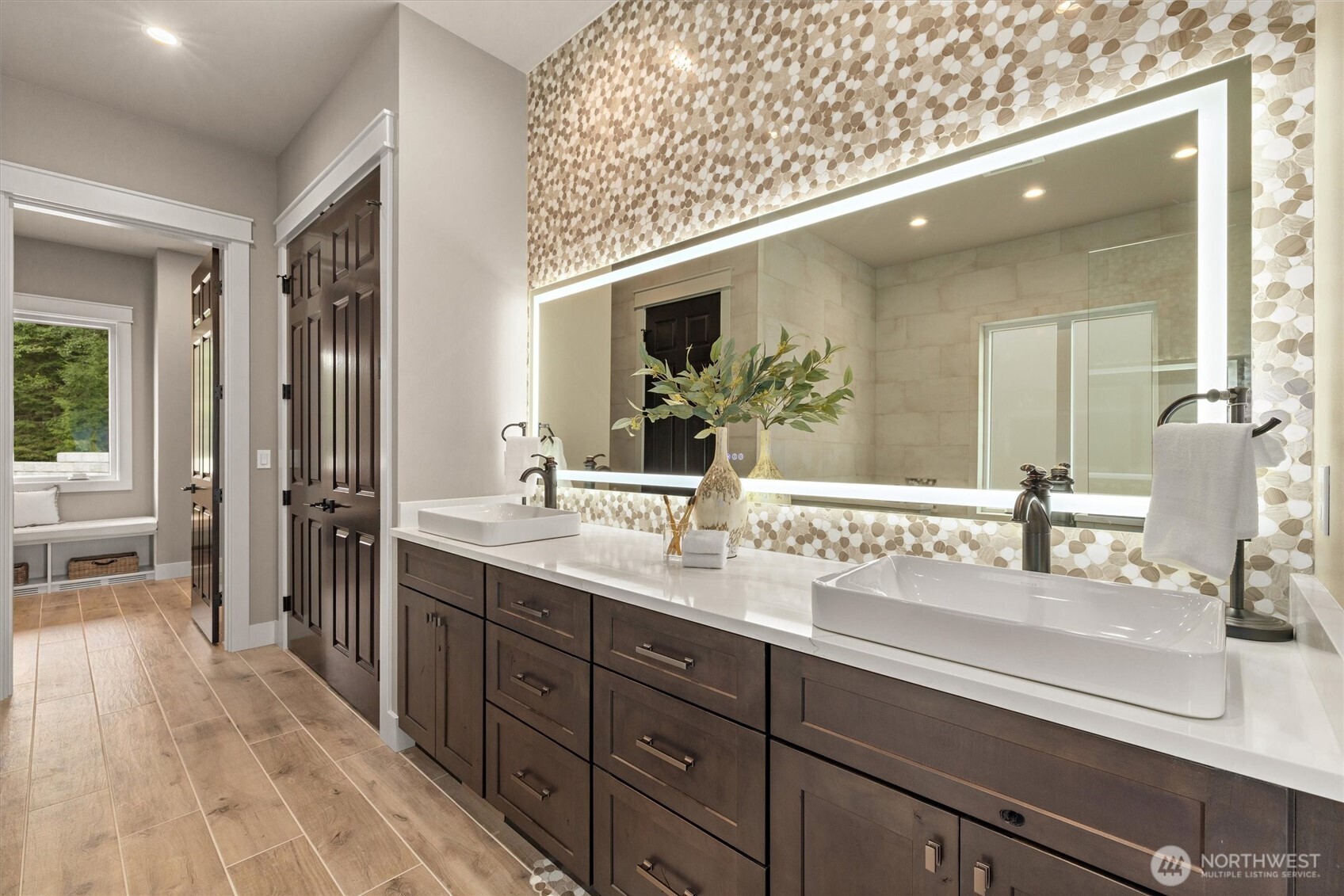 151 East Windy Ridge Lane Belfair, WA 98528 - Photo 20 of 40 a bathroom with a sink double vanity granite tub and shower