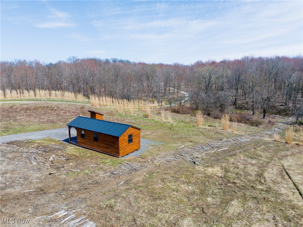 State Road Kingsville, OH 44048 - Photo 3 of 38 Drone / aerial view with a wooded view