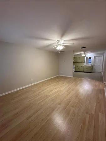 a view of a livingroom with wooden floor