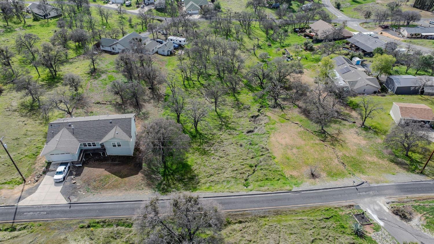 2172 Arrowhead Street Copperopolis, CA 95228 - Photo 7 of 12 an aerial view of a house with a yard