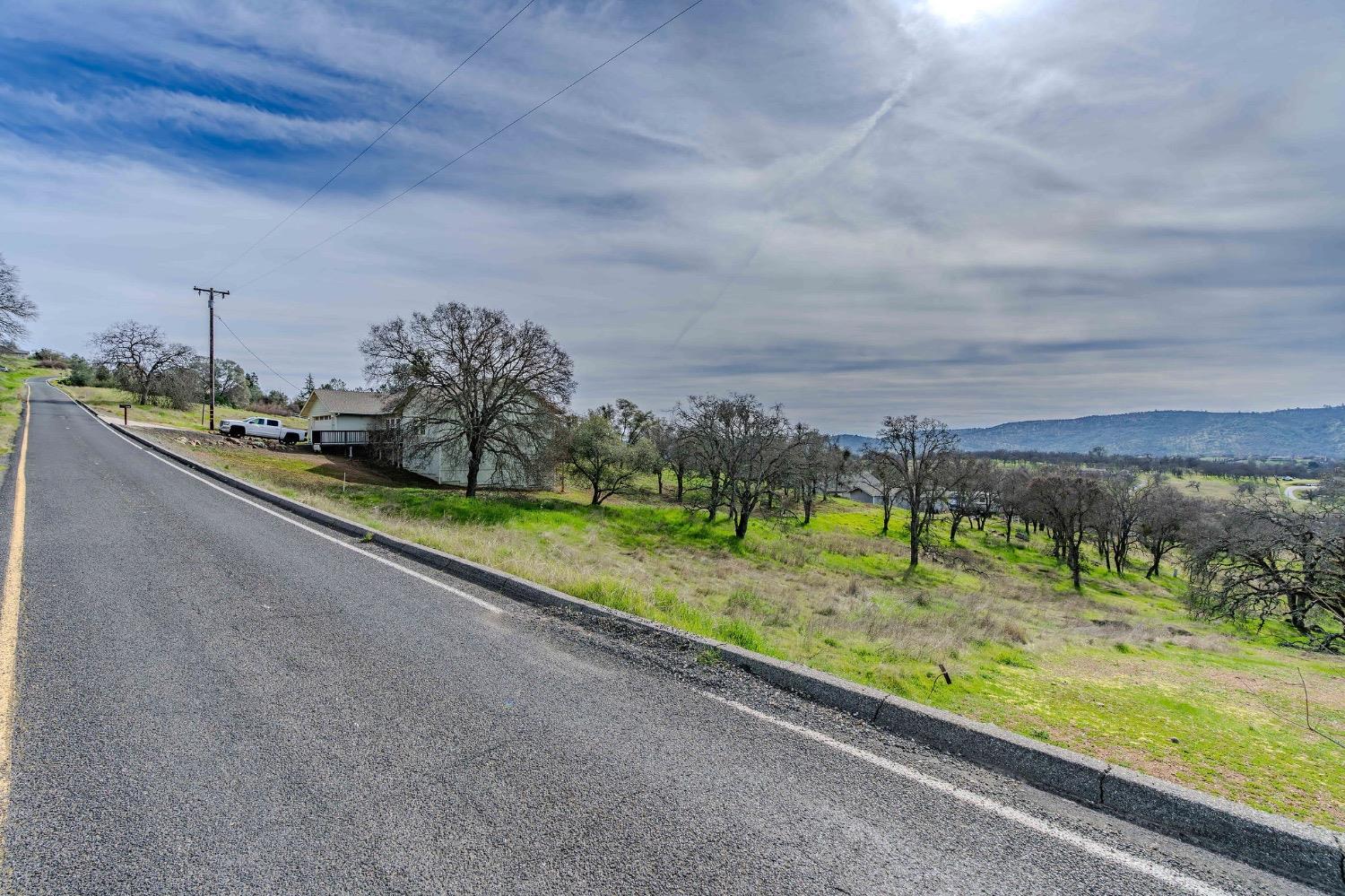 2172 Arrowhead Street Copperopolis, CA 95228 - Photo 10 of 12 a view of a yard with wooden fence