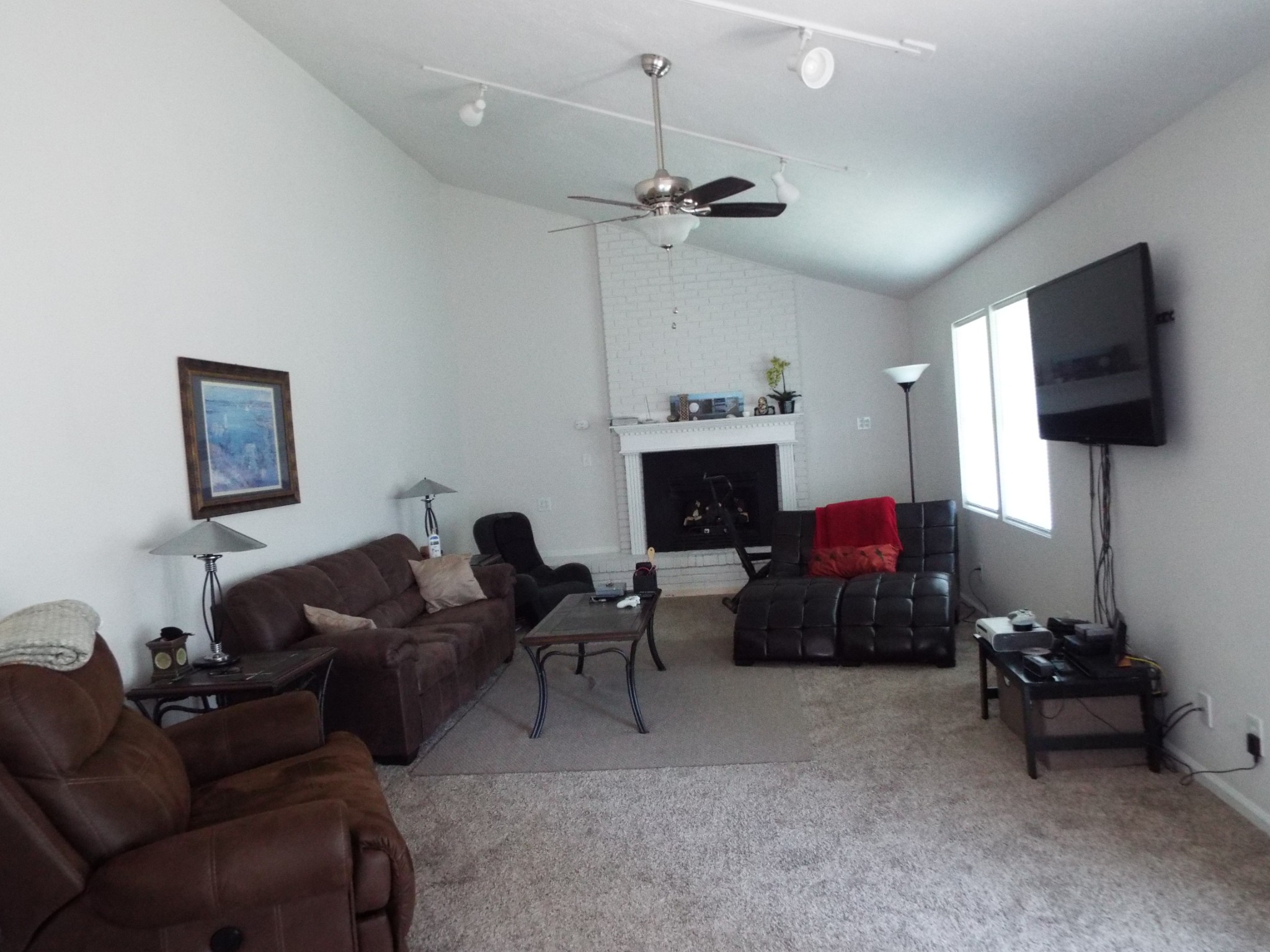 2930 Franklin Road Lebanon, TN 37090 - Photo 5 of 19 a living room with furniture a flat screen tv and a fireplace