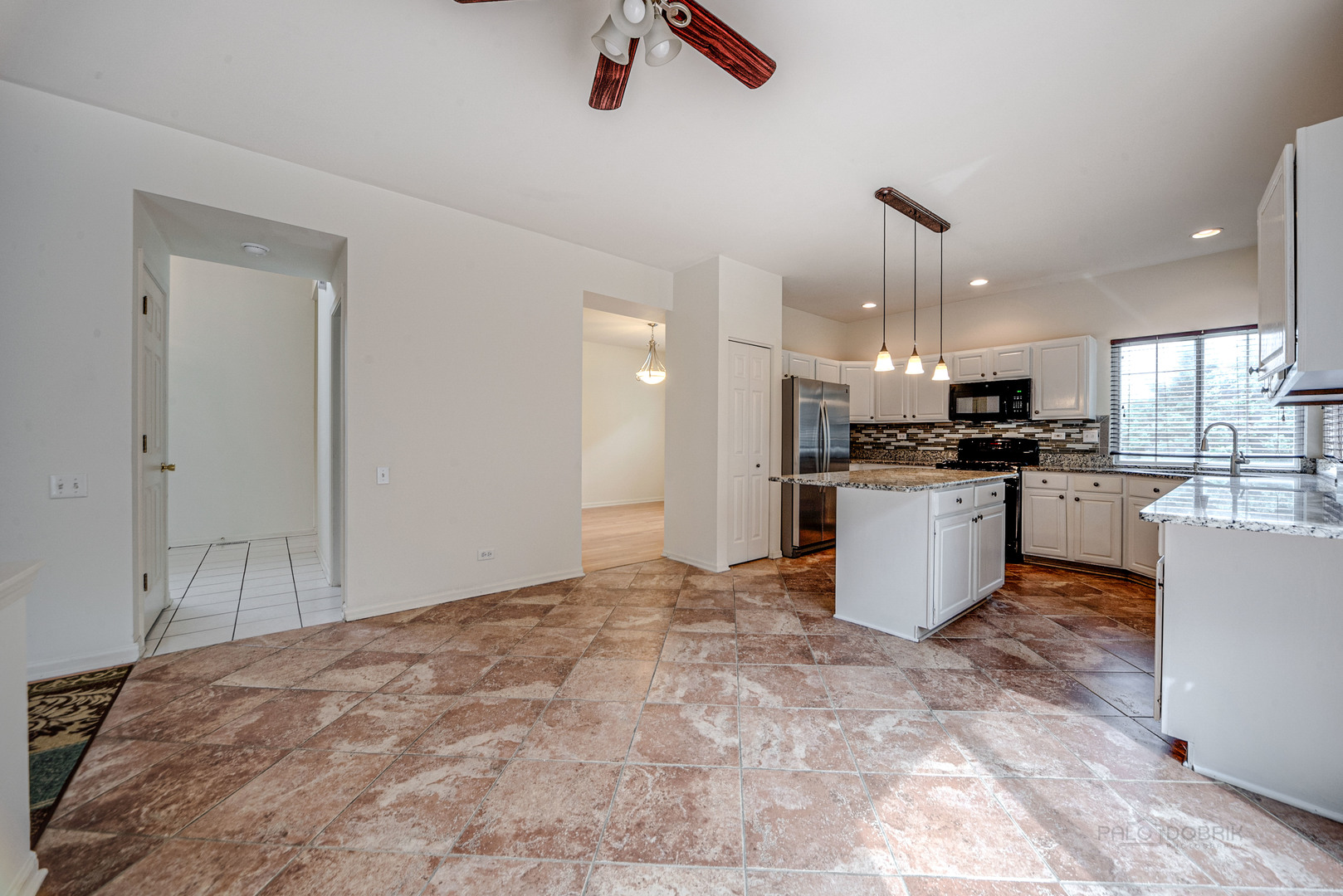 185 Aberdeen Drive Algonquin, IL 60102 - Photo 11 of 36 a view of a kitchen with microwave and cabinets