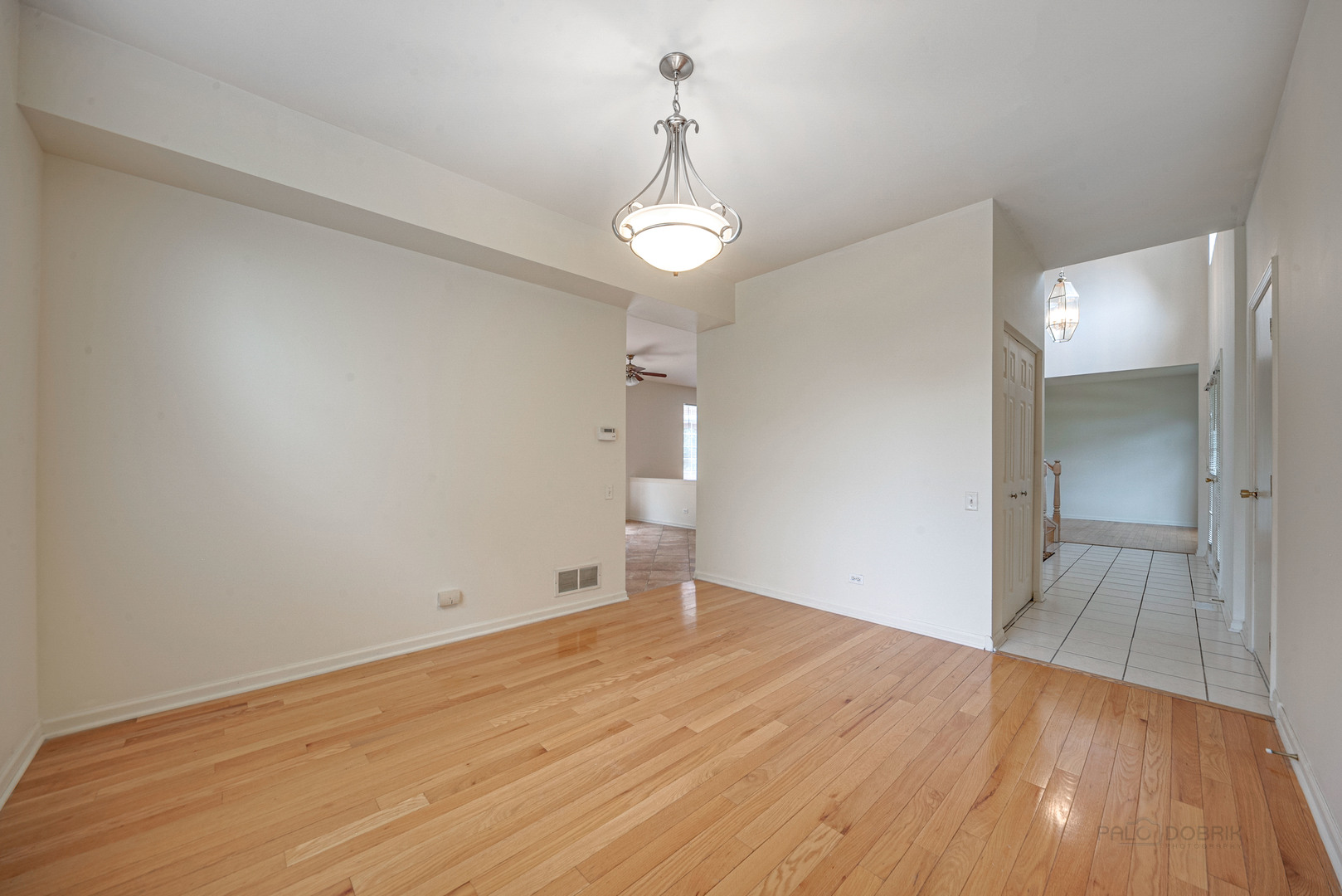 185 Aberdeen Drive Algonquin, IL 60102 - Photo 17 of 36 wooden floor in an empty room with a window
