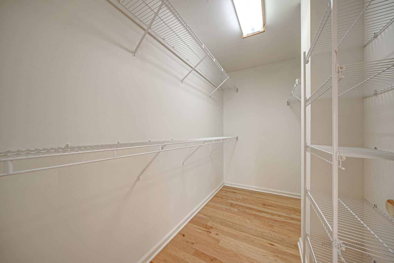 185 Aberdeen Drive Algonquin, IL 60102 - Photo 25 of 36 a view of a room with racks on the wall