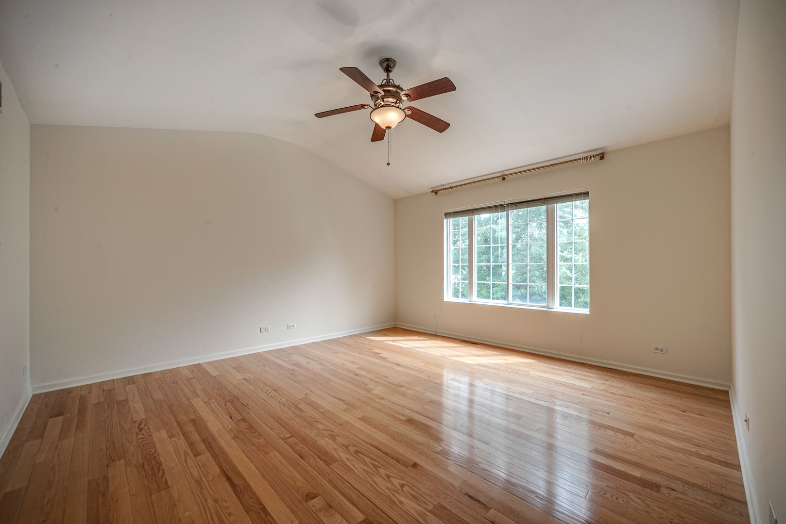 185 Aberdeen Drive Algonquin, IL 60102 - Photo 26 of 36 a view of empty room with wooden floor and fan