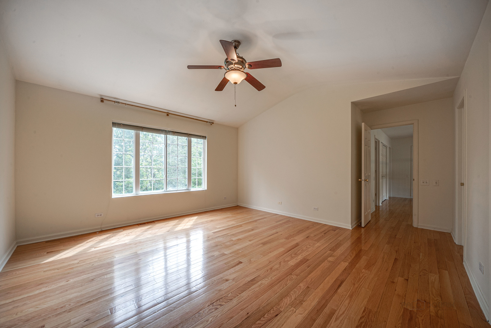 185 Aberdeen Drive Algonquin, IL 60102 - Photo 28 of 36 a view of empty room with wooden floor and fan