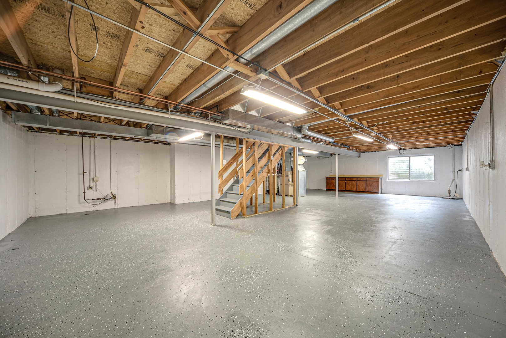 185 Aberdeen Drive Algonquin, IL 60102 - Photo 31 of 36 a view of water heater room with stairs