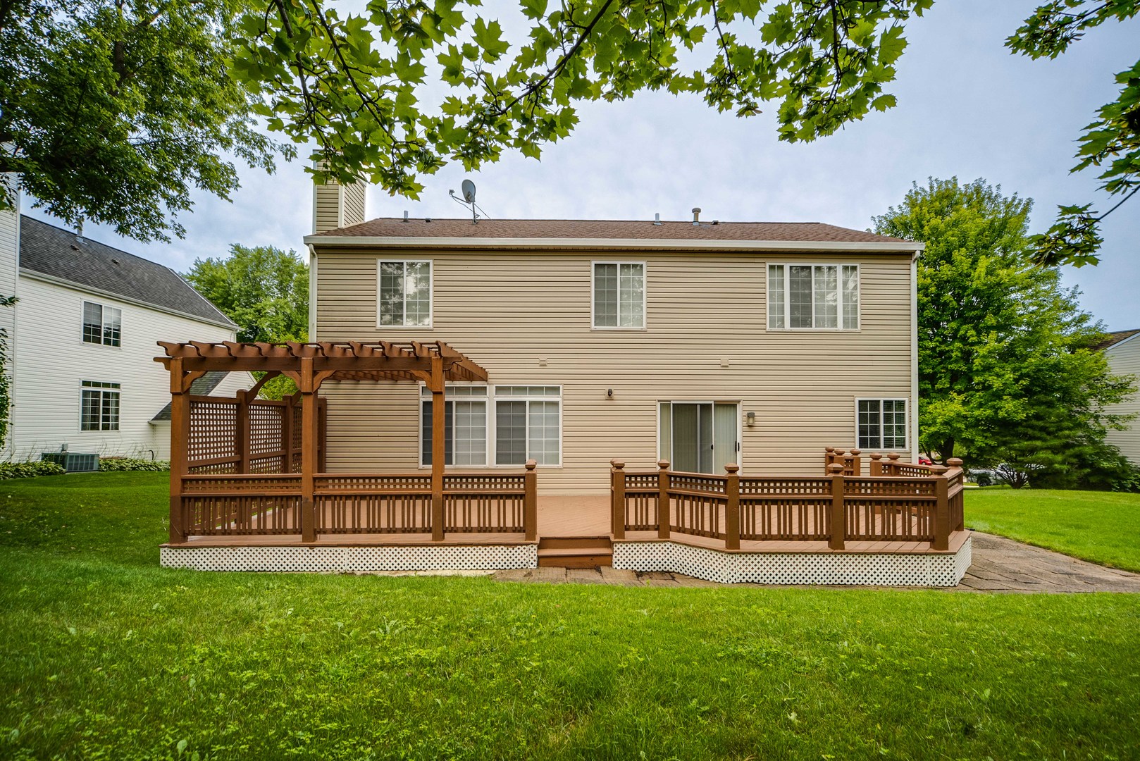 185 Aberdeen Drive Algonquin, IL 60102 - Photo 34 of 36 a view of a house with a yard and sitting area
