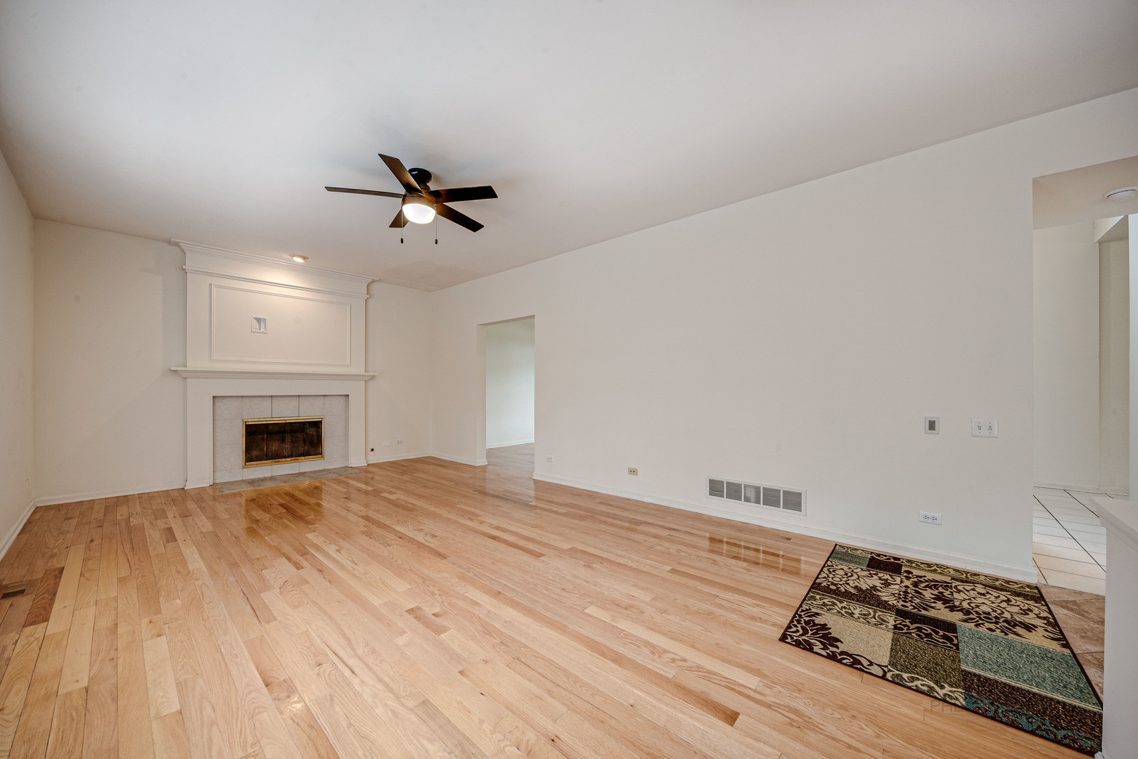 185 Aberdeen Drive Algonquin, IL 60102 - Photo 8 of 36 a view of empty room with cabinet and ceiling fan