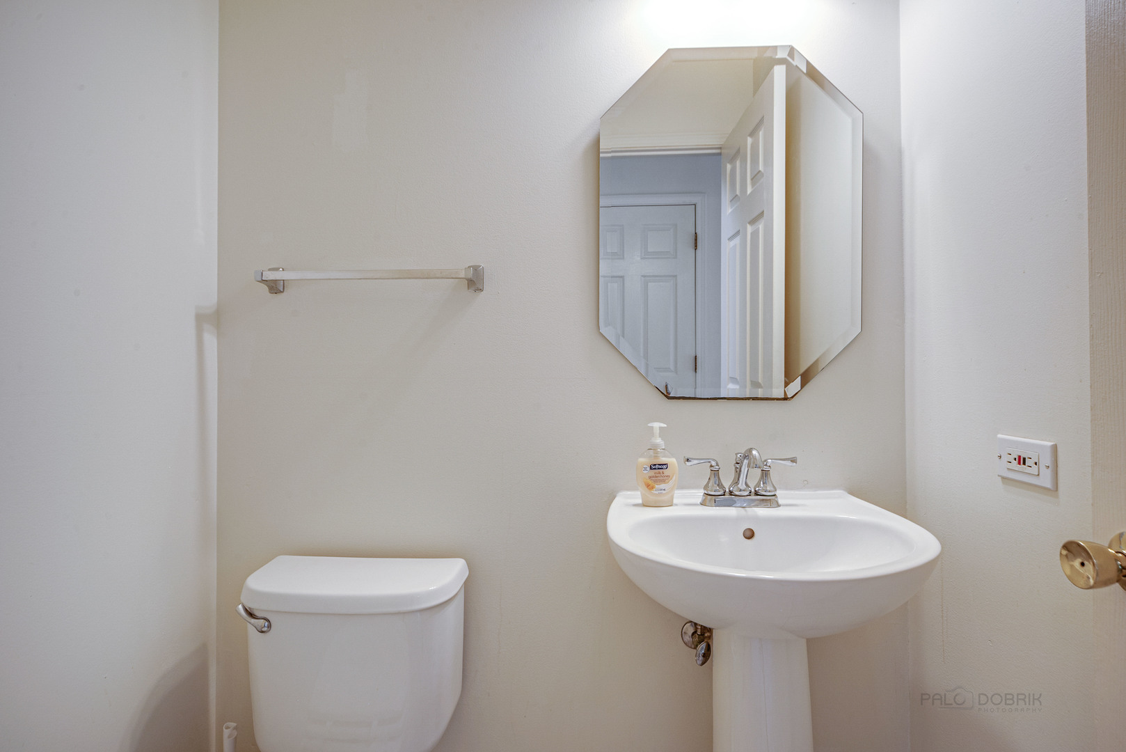 185 Aberdeen Drive Algonquin, IL 60102 - Photo 9 of 36 a bathroom with a toilet sink and mirror