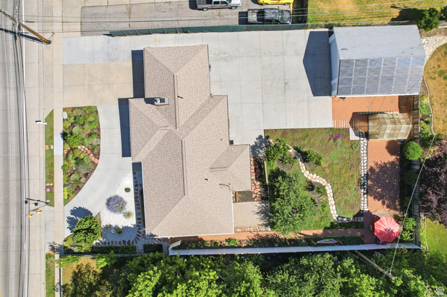 1180 North 400 East Bountiful, UT 84010 - Photo 43 of 50 Expansive property featuring a multi-gabled roofline, concrete driveway, and a detached structure