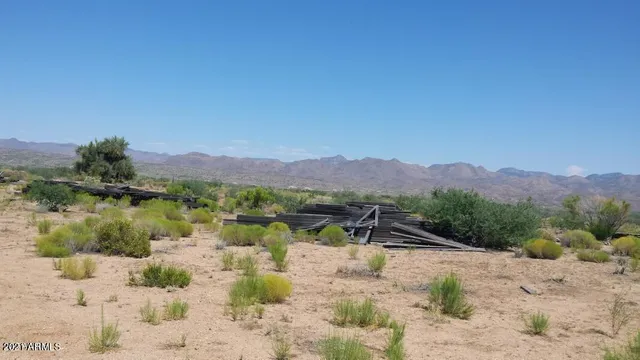 a view of a lake with a mountain