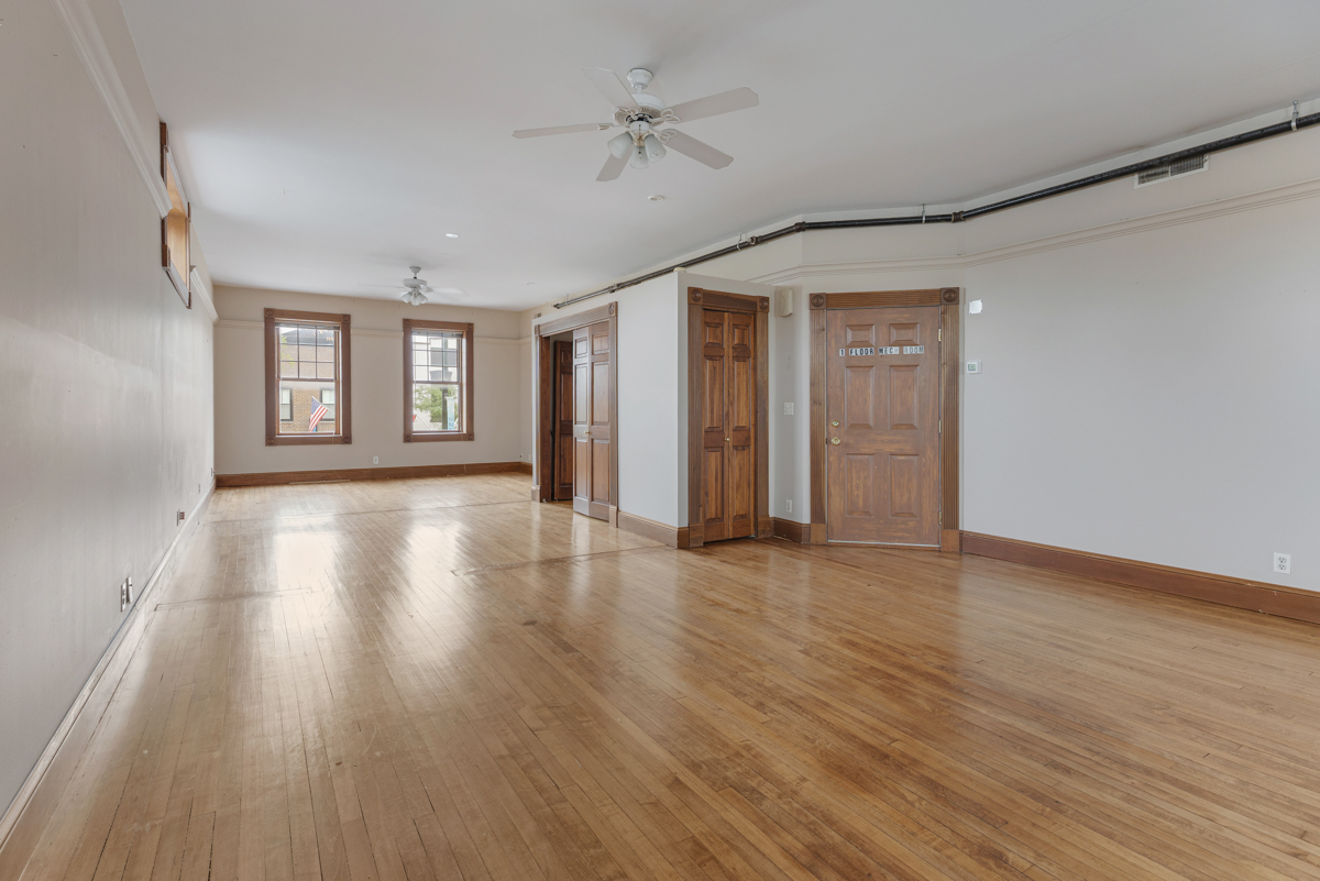 222 West Main Street, Unit A St. Charles, IL 60174 - Photo 11 of 17 a view of an empty room with wooden floor and a window