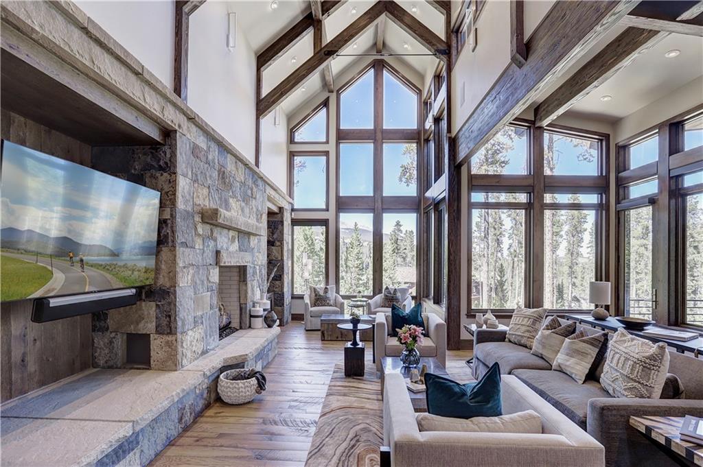 121 Boulder Circle Breckenridge, CO 80424 - Photo 2 of 35 a living room with furniture or outdoor view and a large window