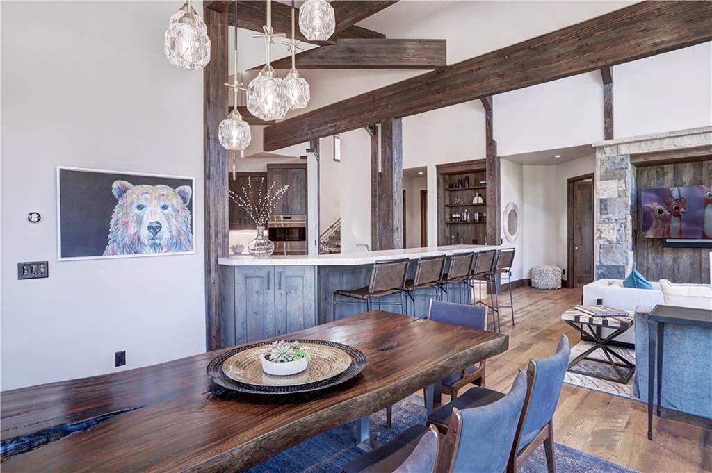 121 Boulder Circle Breckenridge, CO 80424 - Photo 12 of 35 a view of a dining room with furniture and wooden floor