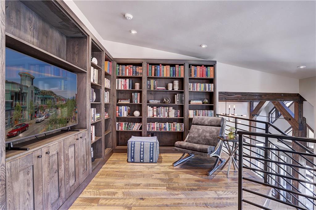121 Boulder Circle Breckenridge, CO 80424 - Photo 16 of 35 a living room with furniture and a flat screen tv