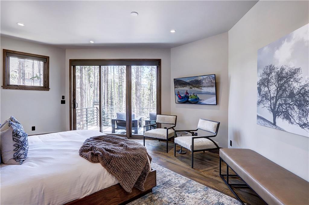 121 Boulder Circle Breckenridge, CO 80424 - Photo 20 of 35 a bed room with a bed and a chair