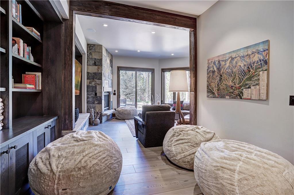 121 Boulder Circle Breckenridge, CO 80424 - Photo 25 of 35 a living room with furniture and a flat screen tv