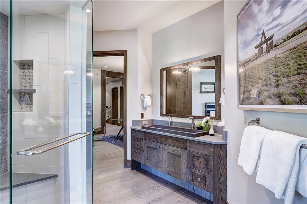 121 Boulder Circle Breckenridge, CO 80424 - Photo 32 of 35 a bathroom with double vanity and a mirror