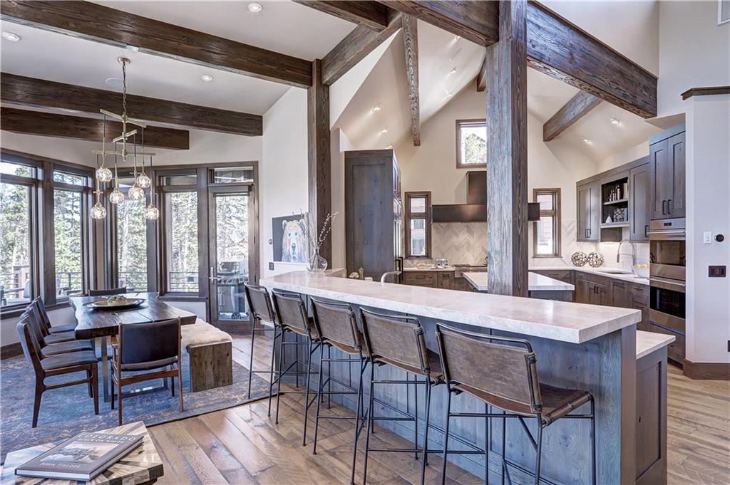 121 Boulder Circle Breckenridge, CO 80424 - Photo 7 of 35 a view of a dining room with furniture window and wooden floor