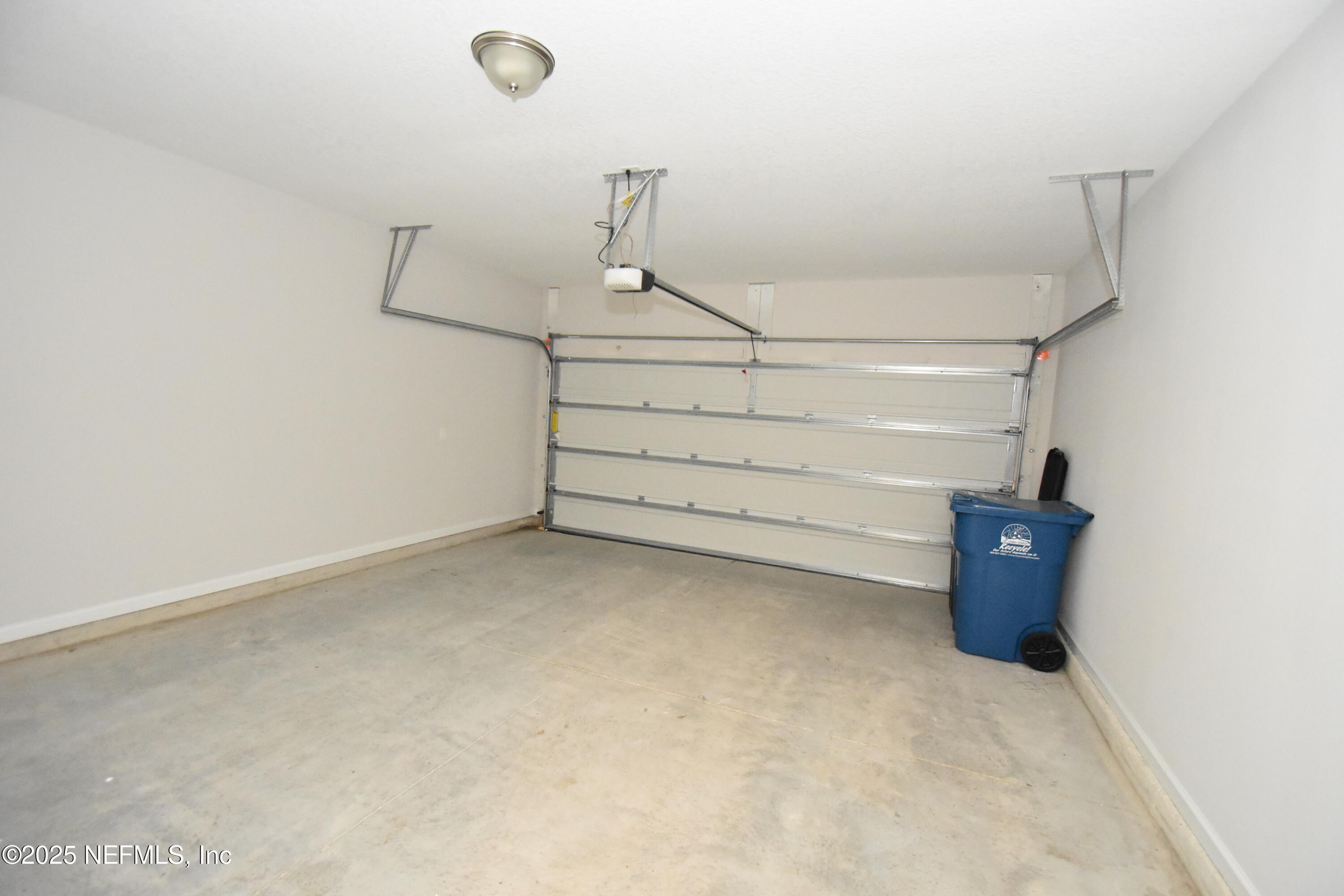 172 Charlie Way St. Augustine, FL 32095 - Photo 26 of 29 a view of a room with racks on the wall