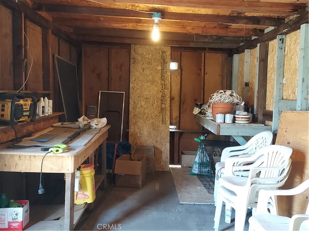 13632 Arrowhead Road Clearlake, CA 95422 - Photo 20 of 28 a living room with furniture and a table