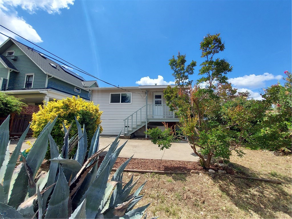 13632 Arrowhead Road Clearlake, CA 95422 - Photo 27 of 28 a view of a house with a yard