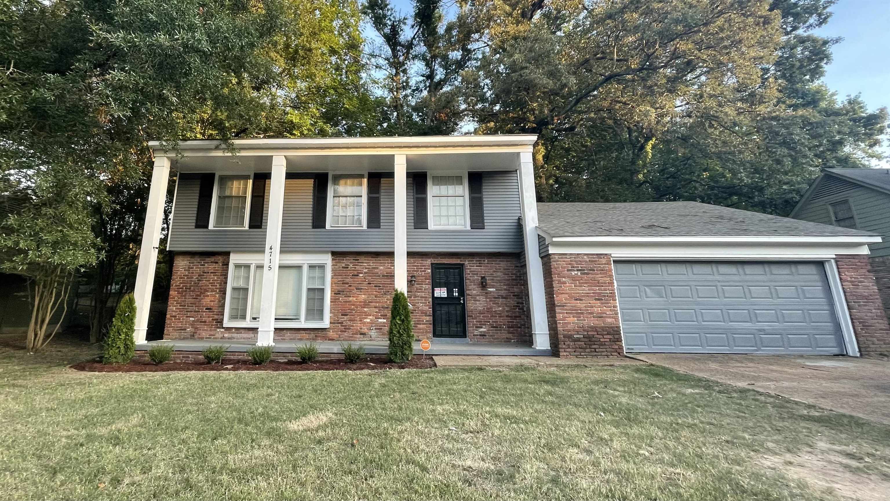 4715 Stage Road Memphis, TN 38128 - Photo 1 of 22 front view of a house with a yard