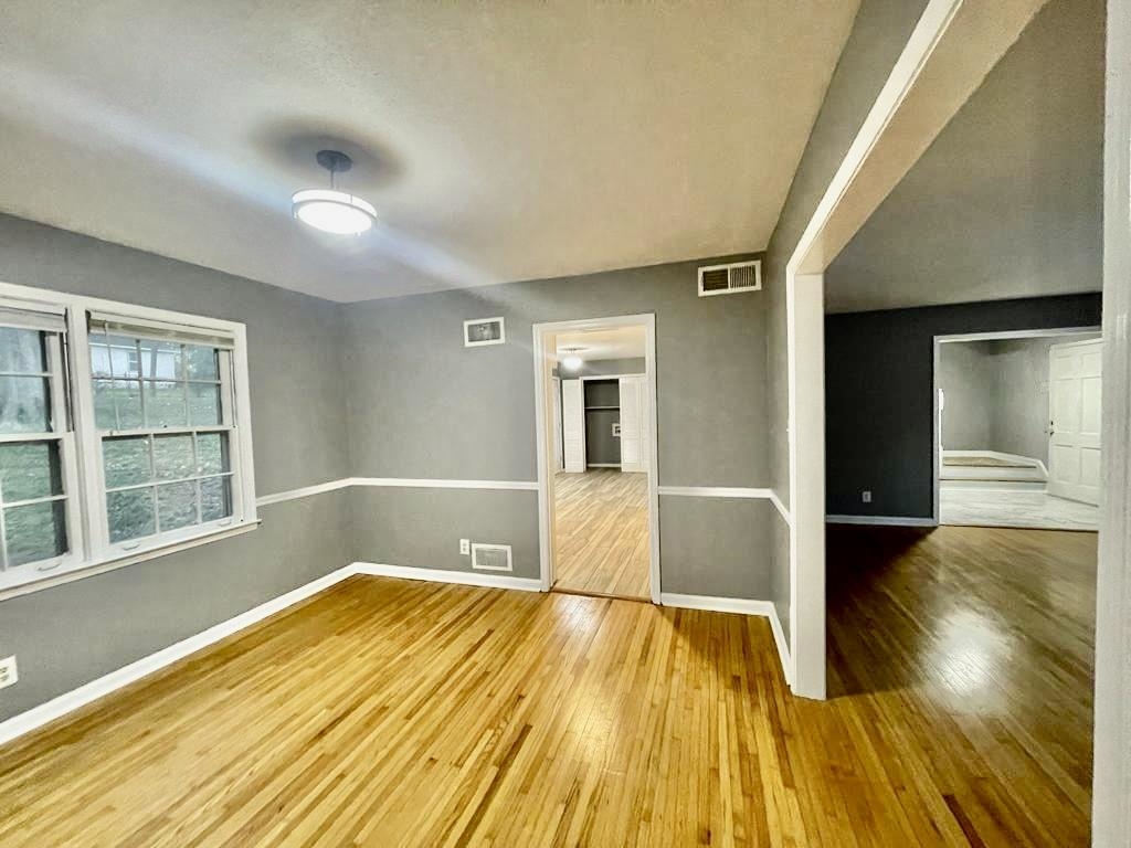 4715 Stage Road Memphis, TN 38128 - Photo 2 of 22 a view of empty room with wooden floor