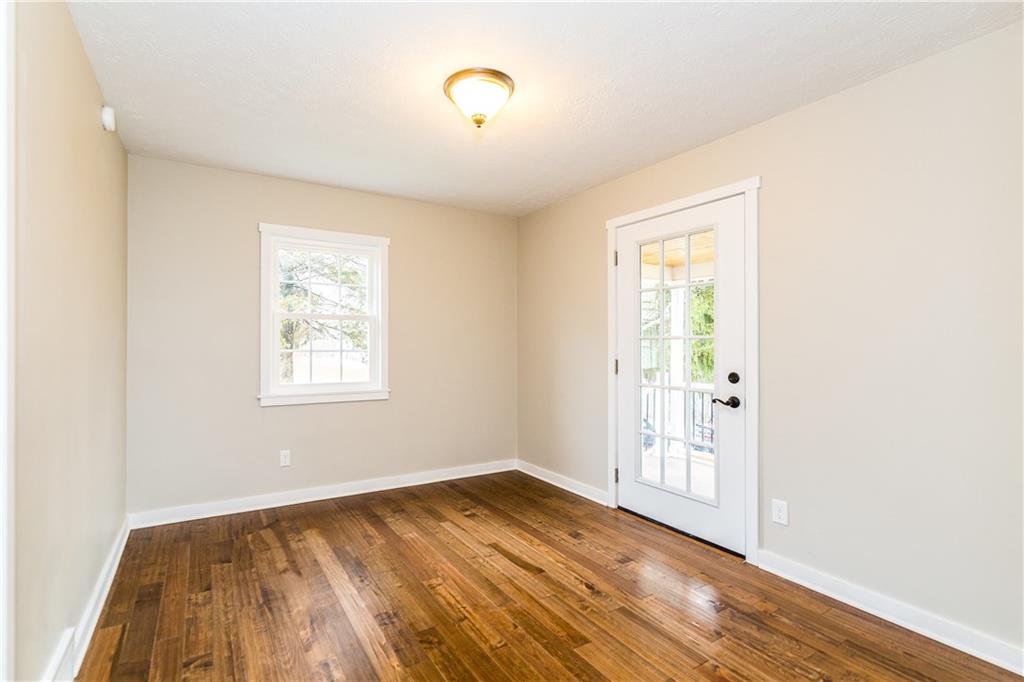 425 Buckingham Road Scenery Hill, PA 15360 - Photo 9 of 24 Beautiful hand scraped flooring in the dining room.