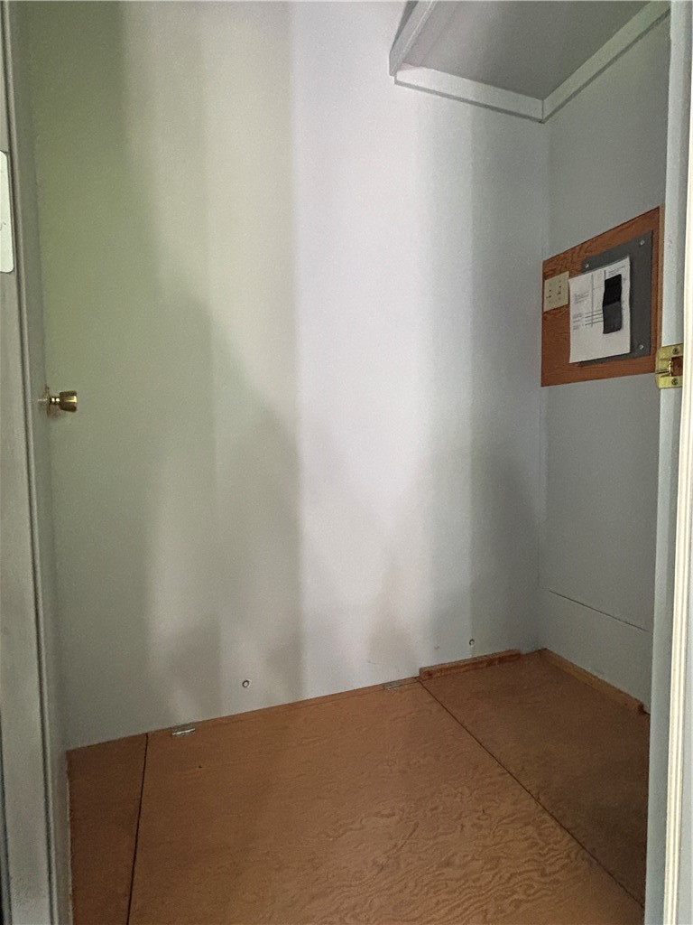 125 Maple Valley Road Worcester, NY 12197 - Photo 20 of 35 Closet in garage with trap door for basement