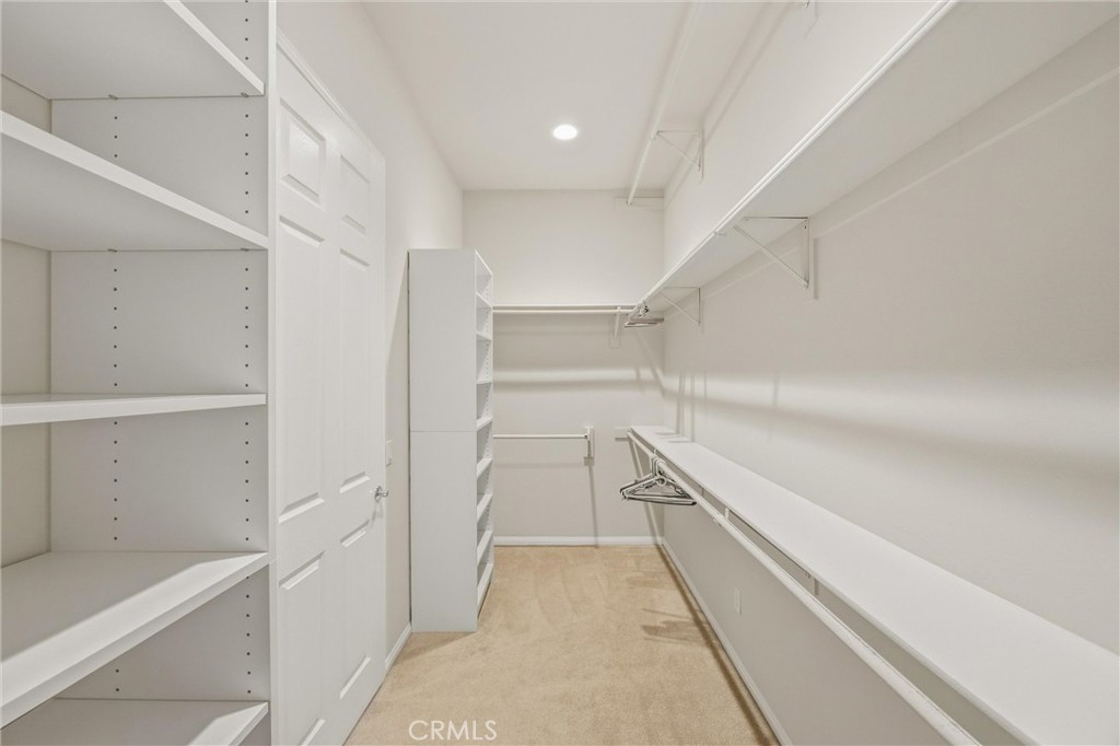 1732 Brittney Road Beaumont, CA 92223 - Photo 27 of 54 a view of an empty walk in closet