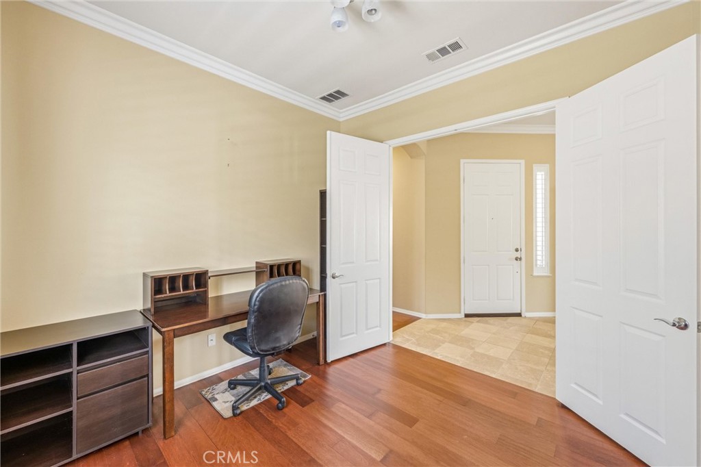 1732 Brittney Road Beaumont, CA 92223 - Photo 29 of 54 a view of workspace with wooden floor windows