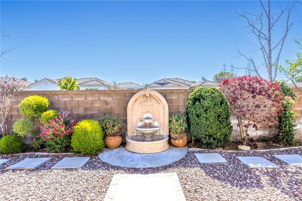 1732 Brittney Road Beaumont, CA 92223 - Photo 39 of 54 a front view of a house with a yard and a outdoor seating