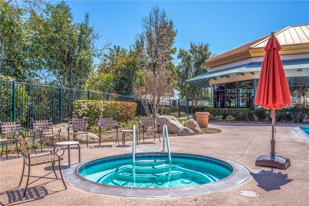 1732 Brittney Road Beaumont, CA 92223 - Photo 48 of 54 a view of a house with a swimming pool