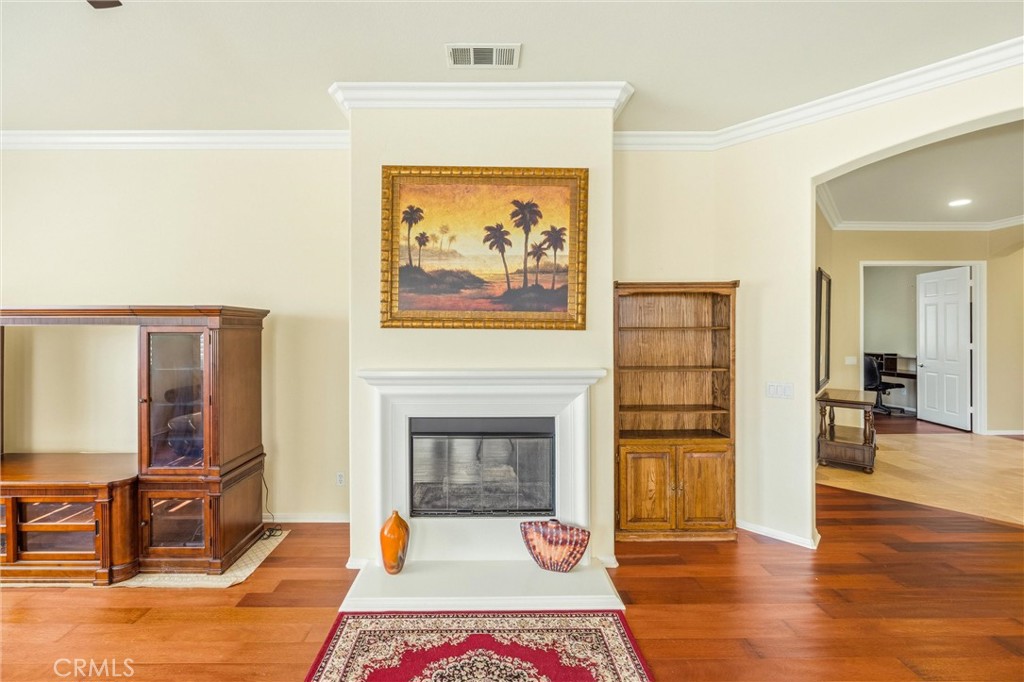 1732 Brittney Road Beaumont, CA 92223 - Photo 9 of 54 a living room with furniture and a fireplace