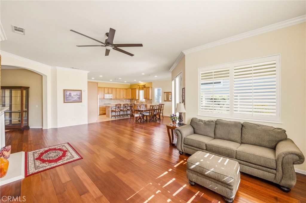 1732 Brittney Road Beaumont, CA 92223 - Photo 10 of 54 a living room with furniture and a large window