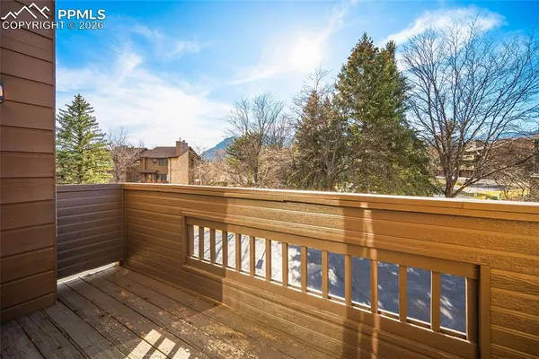 an aerial view of residential houses with yard