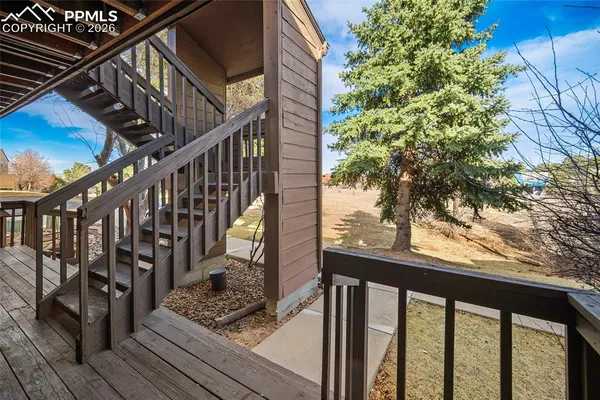 a view of a city with a lake