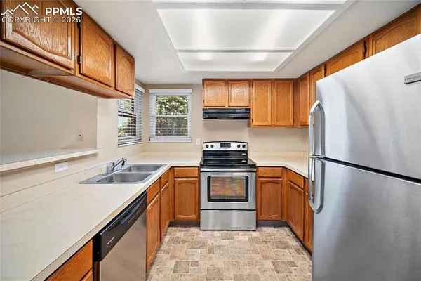 a view of fireplace with a hallway
