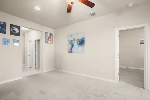 an empty room with shelves