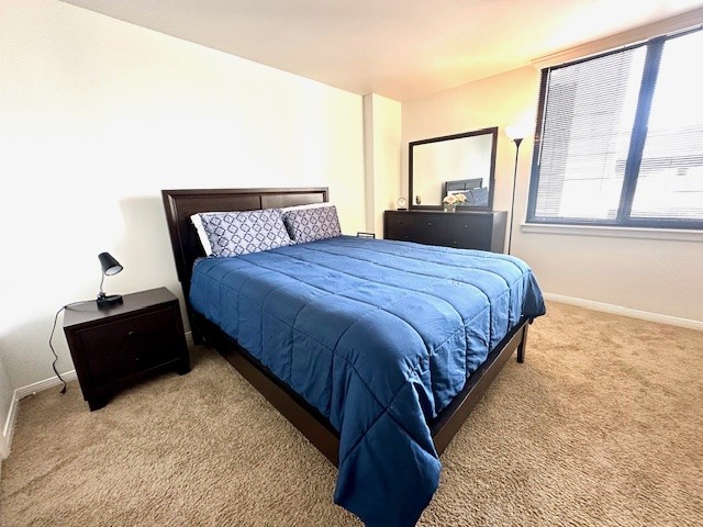 3525 Sage Road, Unit 407 Houston, TX 77056 - Photo 23 of 45 Spacious neutral toned bedroom