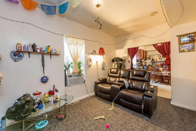 a living room with furniture and a couch