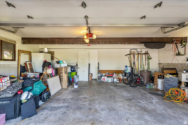 11 South Clark Lane Elk Ridge, UT 84651 - Photo 46 of 46 Garage with a garage door opener