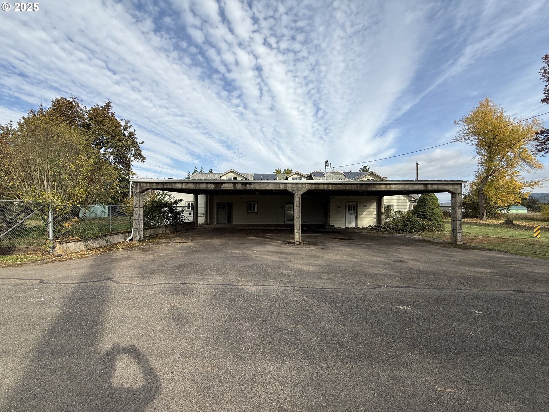 a view of a car parked in front of a building